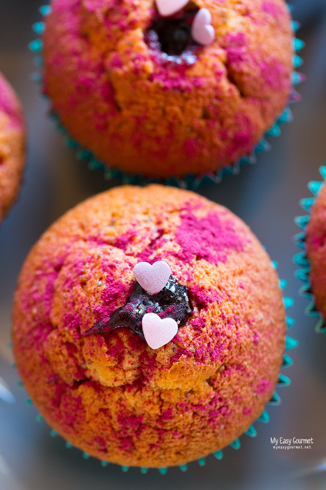 Lemon Poppy Seed Muffins poked with Blueberry jam