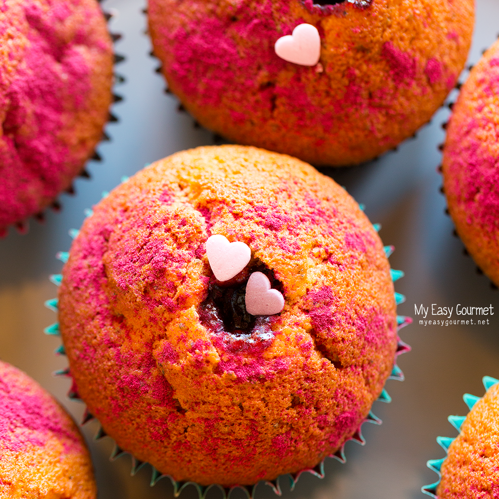 Lemon Poppy Seed Muffins poked with Blueberry jam