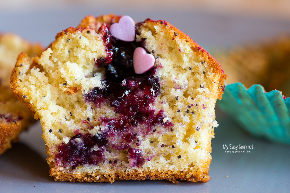 Lemon Poppy Seed Muffins poked with Blueberry jam