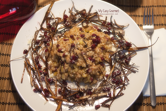 Crispy leek risotto with pine nuts and pomegranate